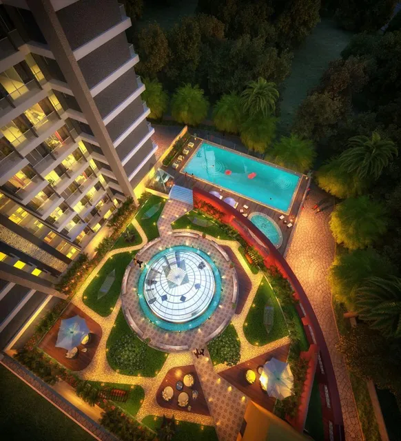 Aerial night render of the pool courtyard with domed skylight