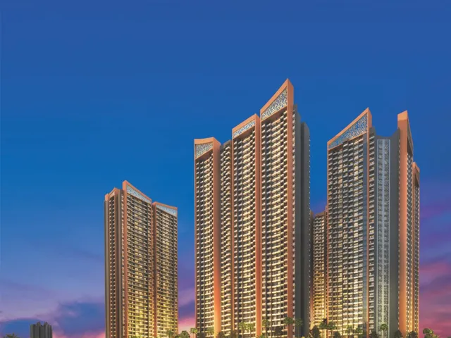 Arihant Aspire township towers at dusk — skyline render